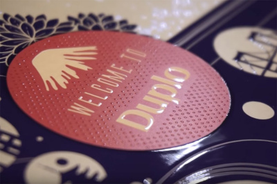 Лакировальная машина Duplo Dusense